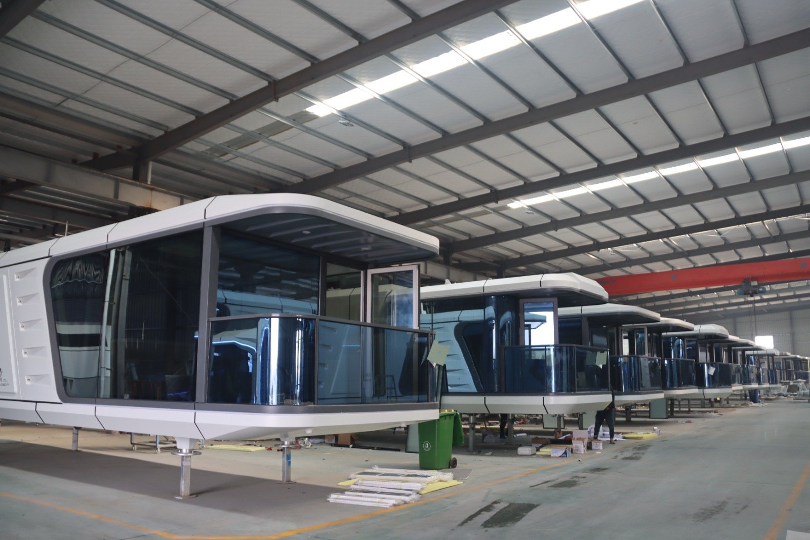 Rock Solid Construction K70 eco cabins in factory production, scalable for two-bedroom layouts, NDIS use, or workforce housing